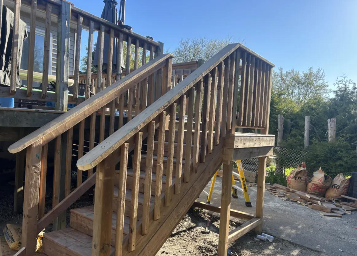 Stairs Built Right completed staircase with new railings and landing