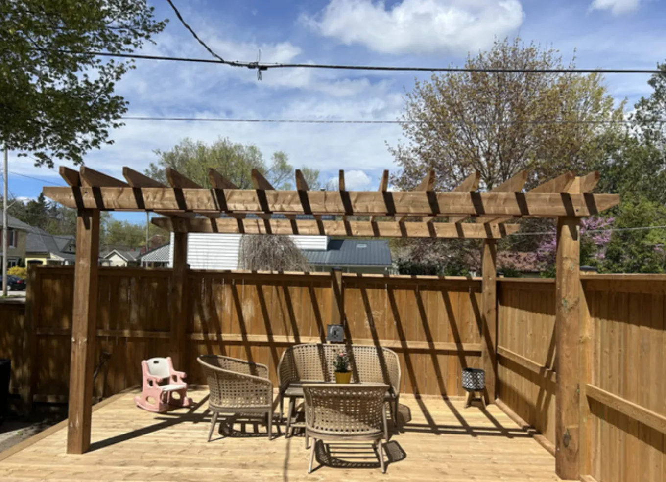 Full Deck-Out completed pergola and seating area on the finished deck