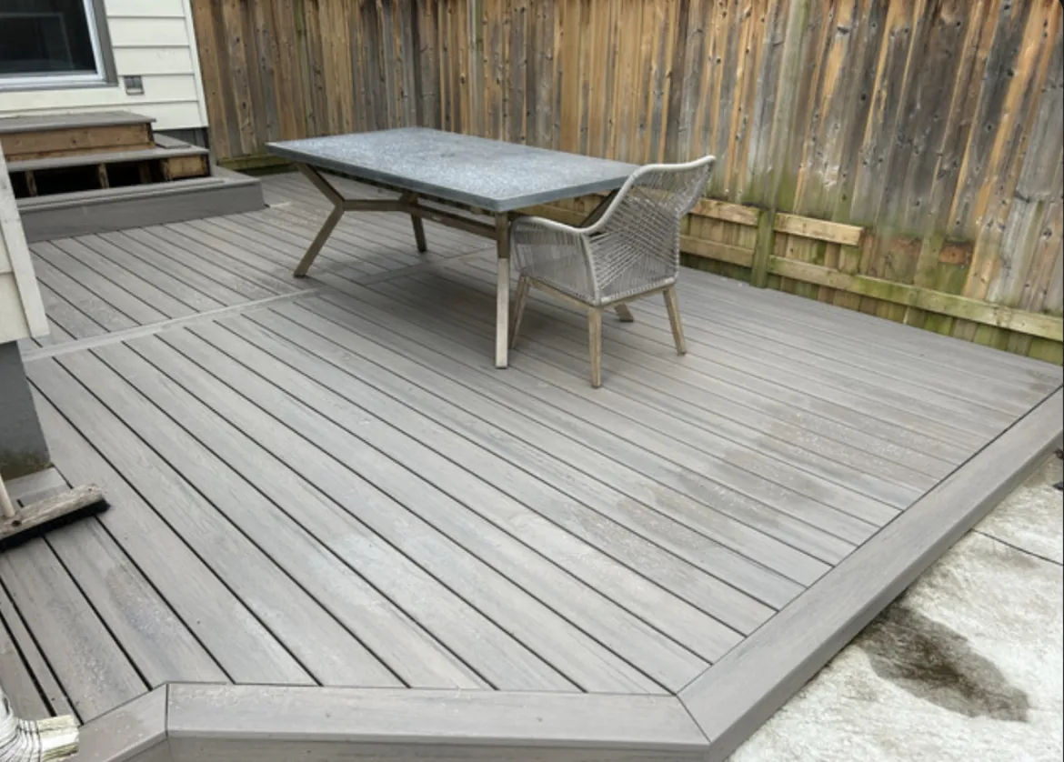 Custom Composite Resurfacing finished deck with dining set